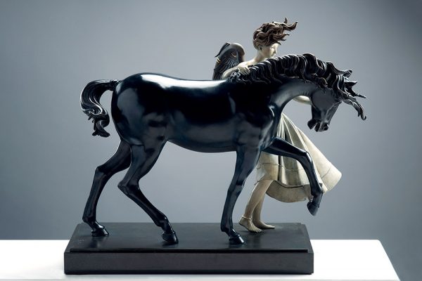 A sculpture of Michael Parkes called Dark Unicorn (Left)
