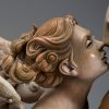 A sculpture of Michael Parkes called Kissing (Close-up)