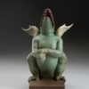 Sculpture of Michael Parkes Laughing Dragon - side 2